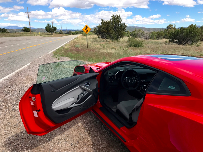 If you look closely, you’ll see a lot of scuff marks on that door card for a car with under 500 miles on the clock. This thing is a pain to get in and out of if you don’t have room to swing that enormous door all the way open.